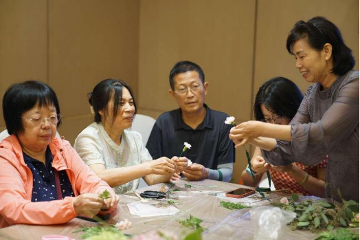 清华社新闻稿-花艺工坊报道815.png