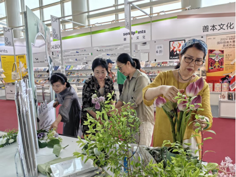 清华社新闻稿-花艺工坊报道575.png